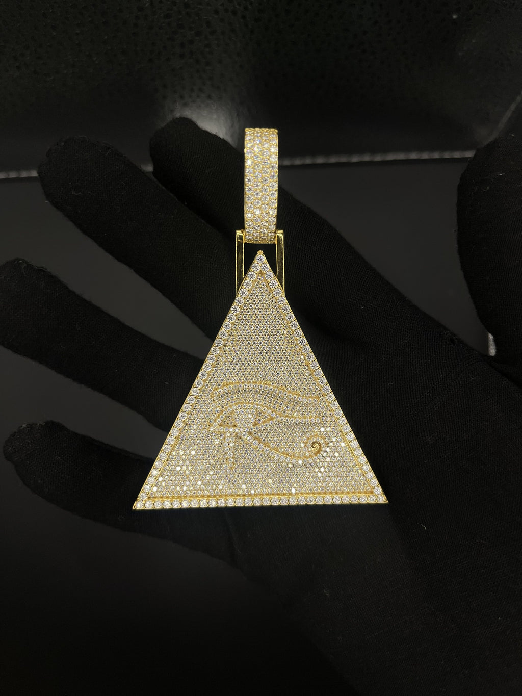 Eye of Horus pyramid pendant detail