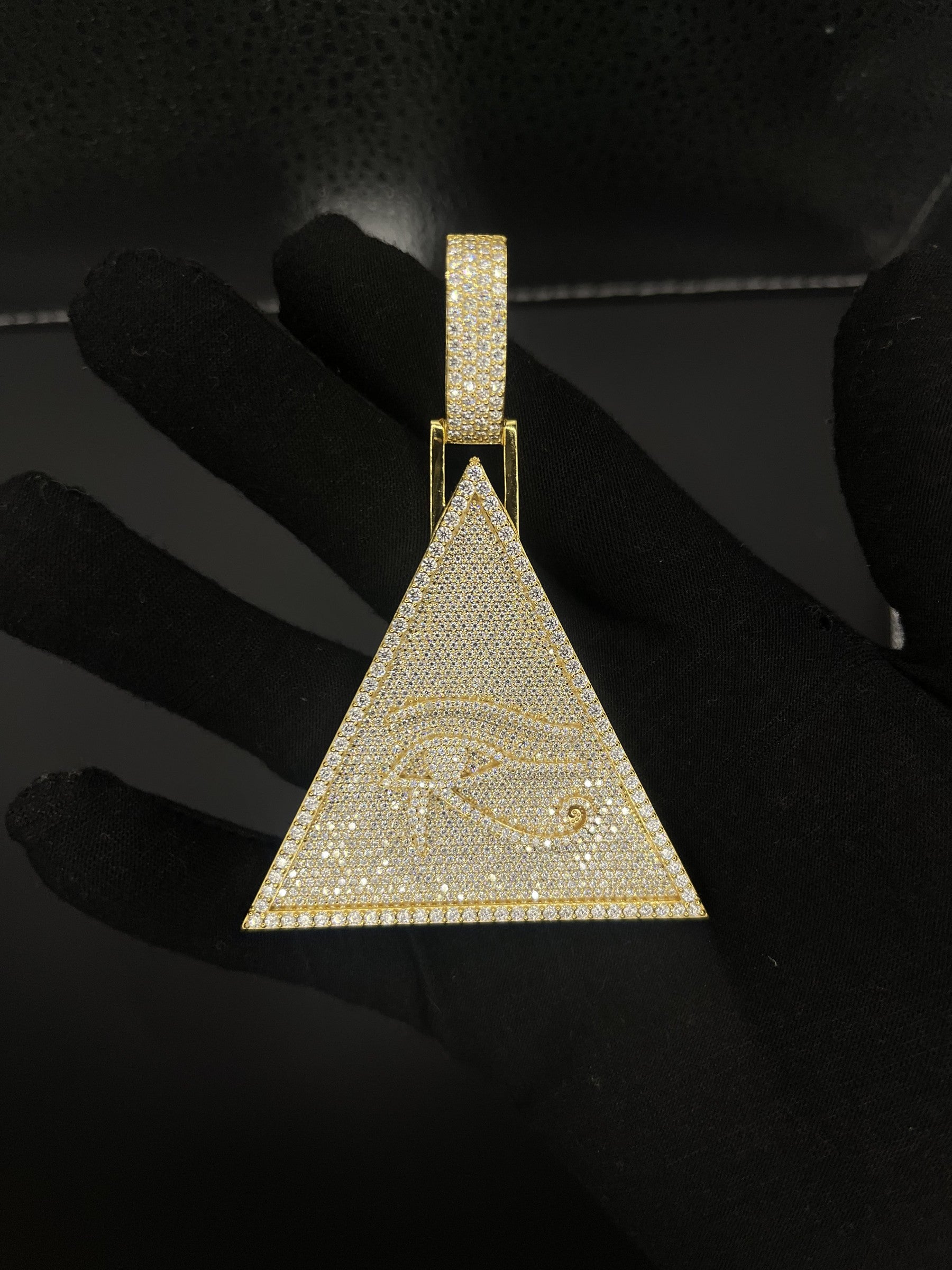 Eye of Horus pyramid pendant detail