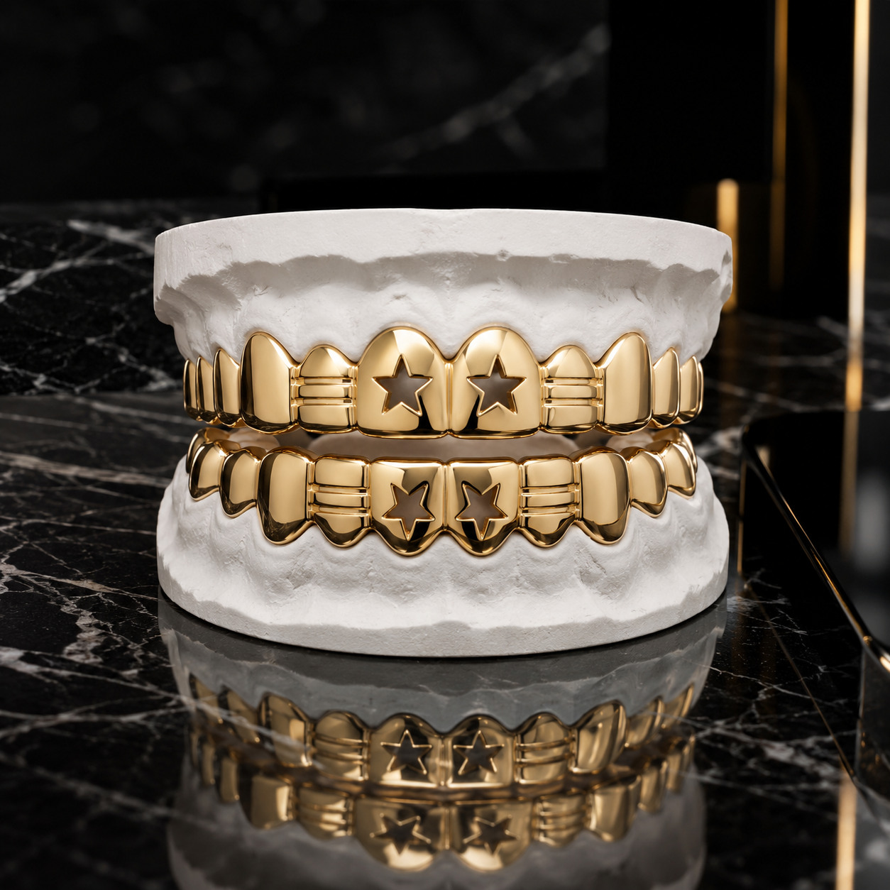 Custom yellow gold Star & Bar Grillz with precision star cutouts displayed on a white dental mold in a luxury jewelry studio.